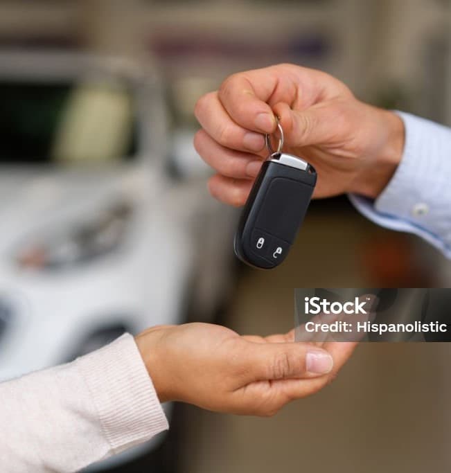 handing keys image